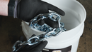 Grade 30 Zinc plated proof coil chain in hand