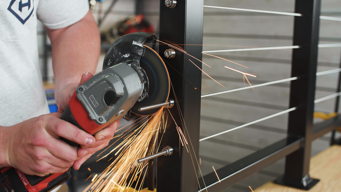 Thru-Post-Tensioners-in-Metal-Posts-angle-grinder Thru-Post-Tensioners-in-Metal-Posts-angle-grinder