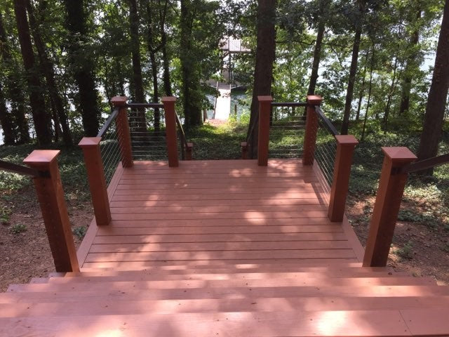 Cabin Deck Transformed by Cable Railing