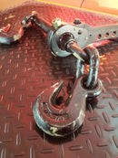 Speedbinders  five  eighths  13000lb  wll  torque  drive  load  binder  green  mark  closeup  on  trailer  deck