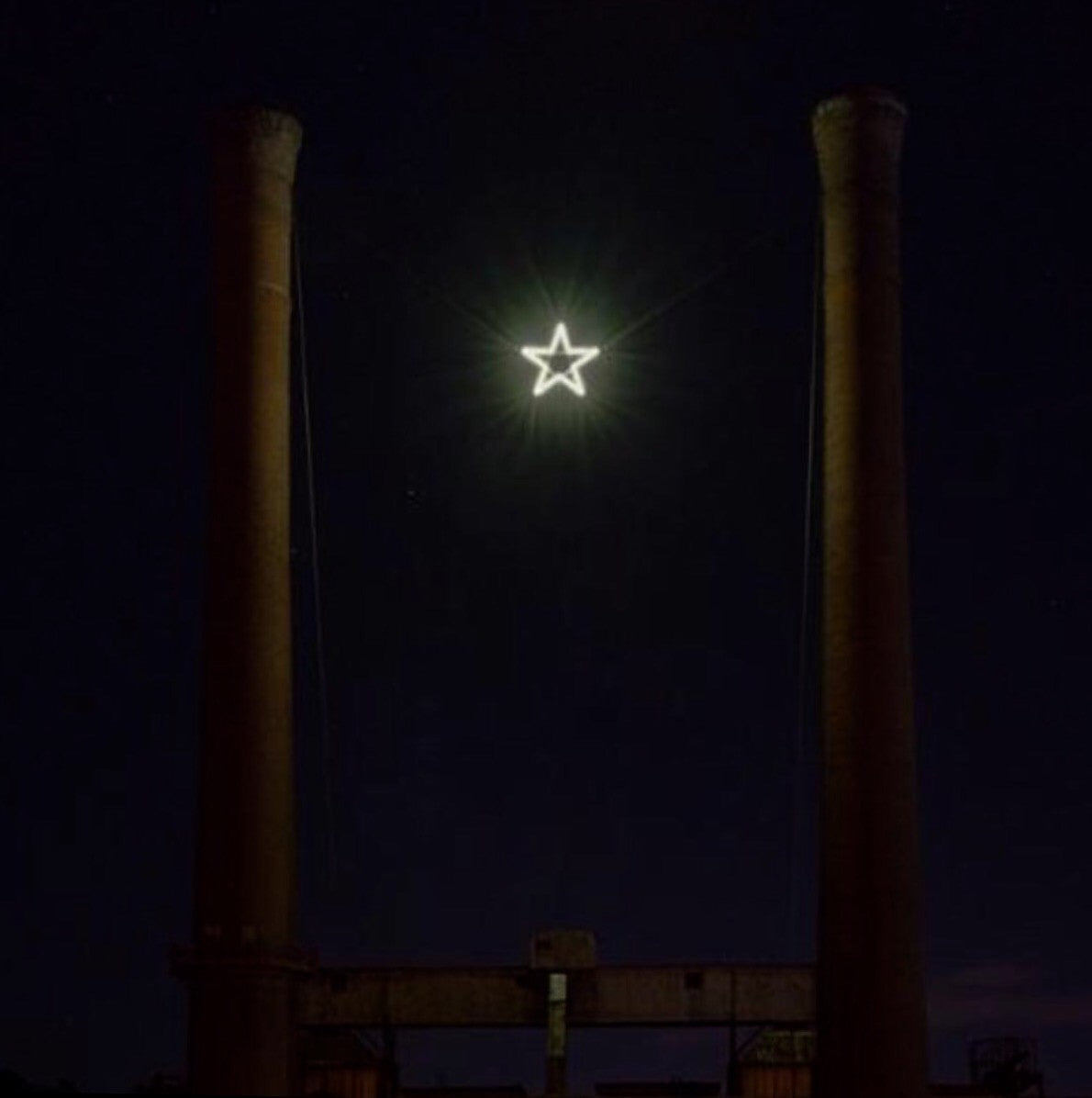 Lindale Star lighting the night sky