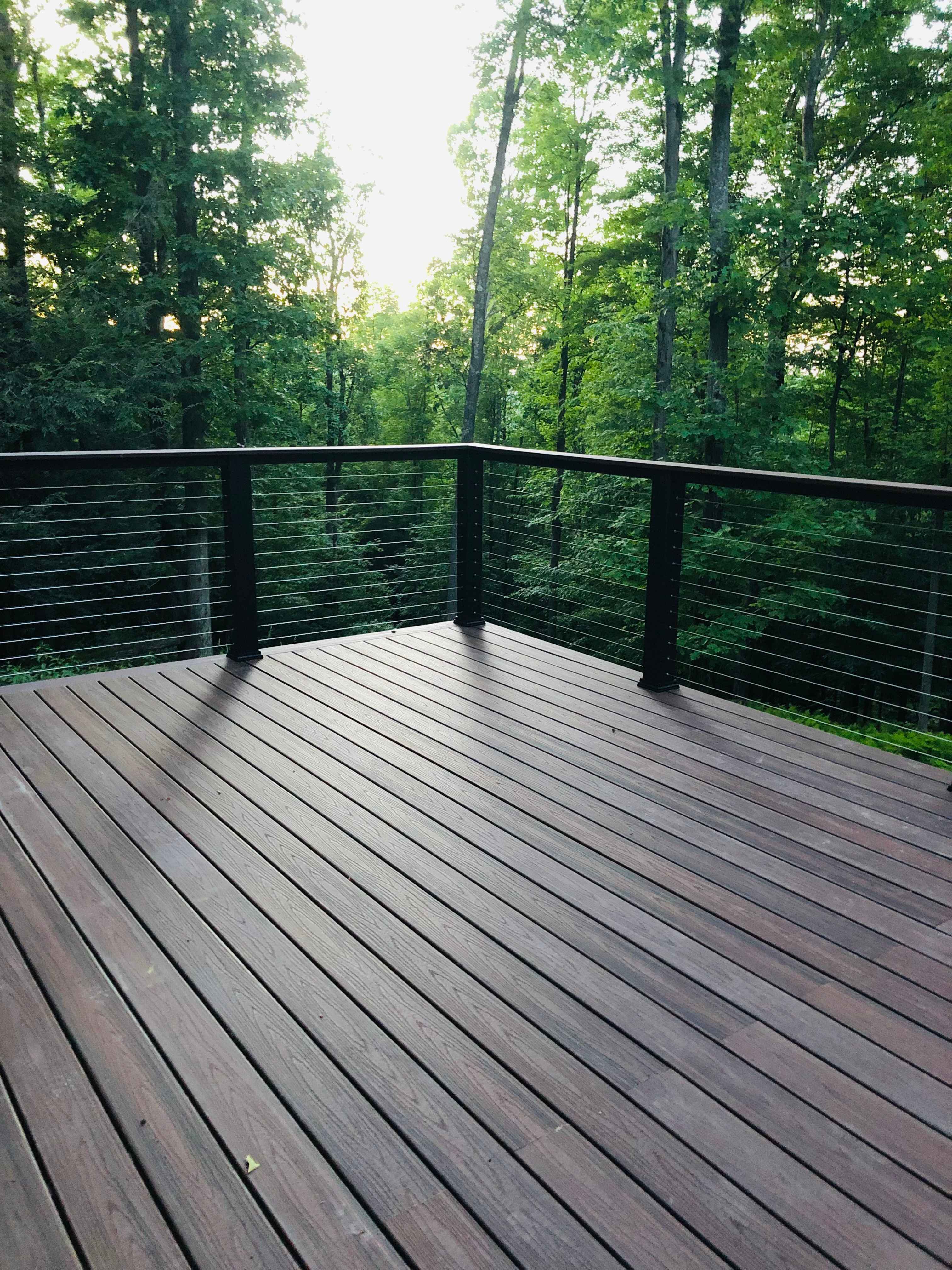 Cable Railing with trees behind it