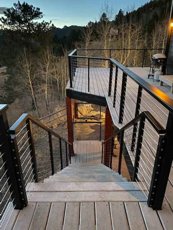 Stairway with cable railing