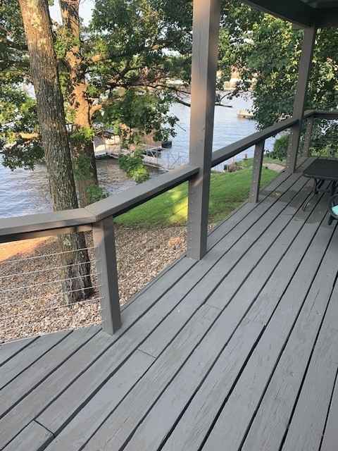 Cable Railing with trees behind it